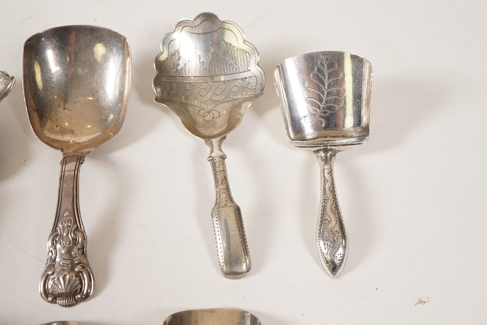Ten assorted mainly 19th century silver caddy spoons, most with shovel bowls